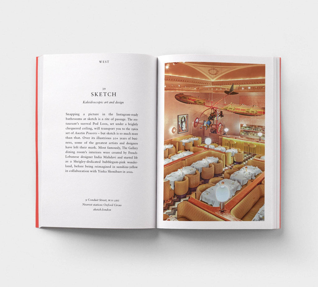 Open book showing interior design layout with text on one page and an image of a restaurant interior on the other.
