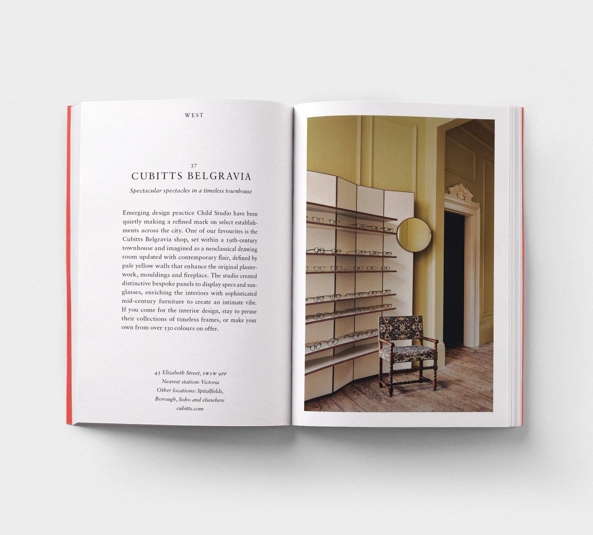 Open book showing interior design layout with text and photo of a room.