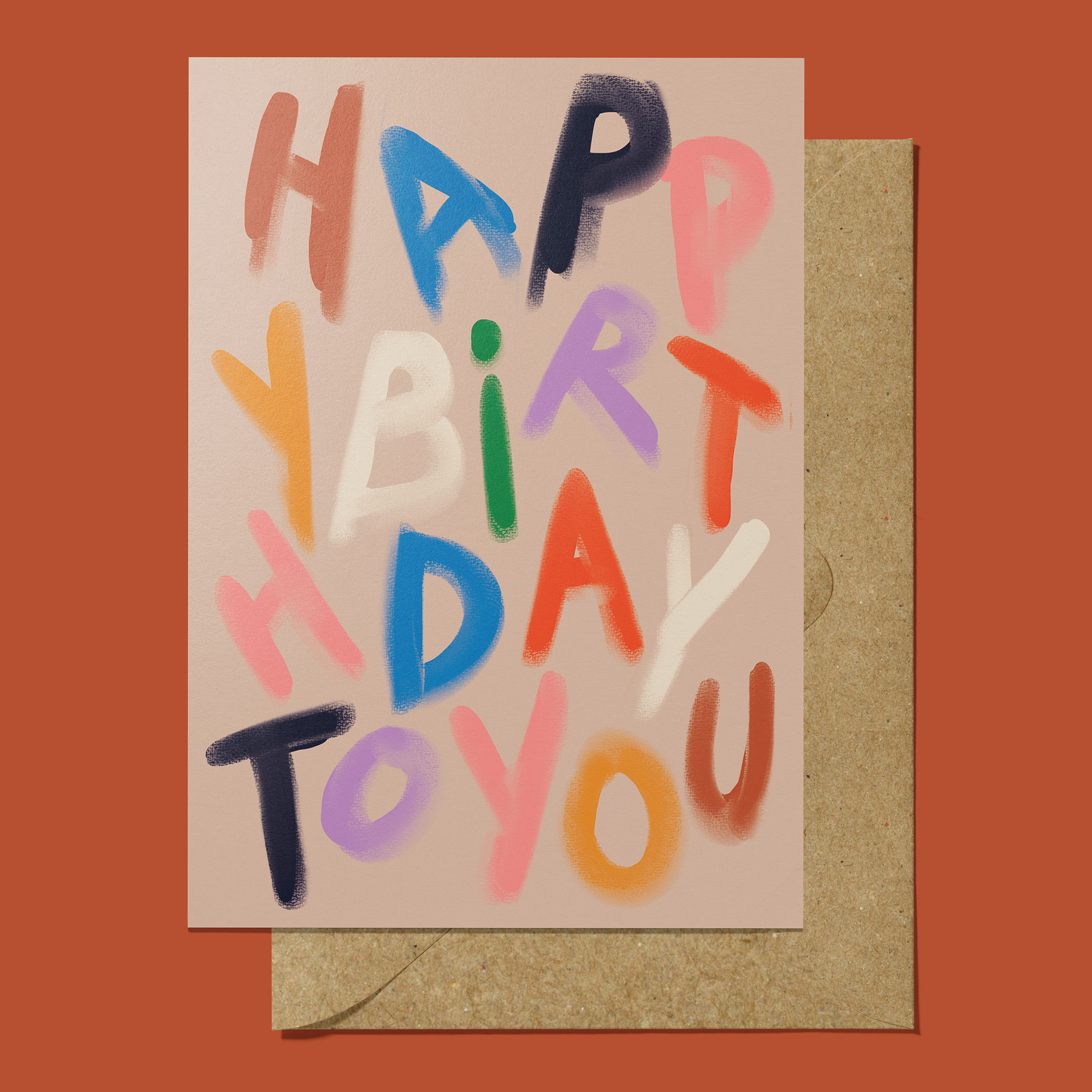 Greetings card with multicoloured text spelling "happy birthday to you"