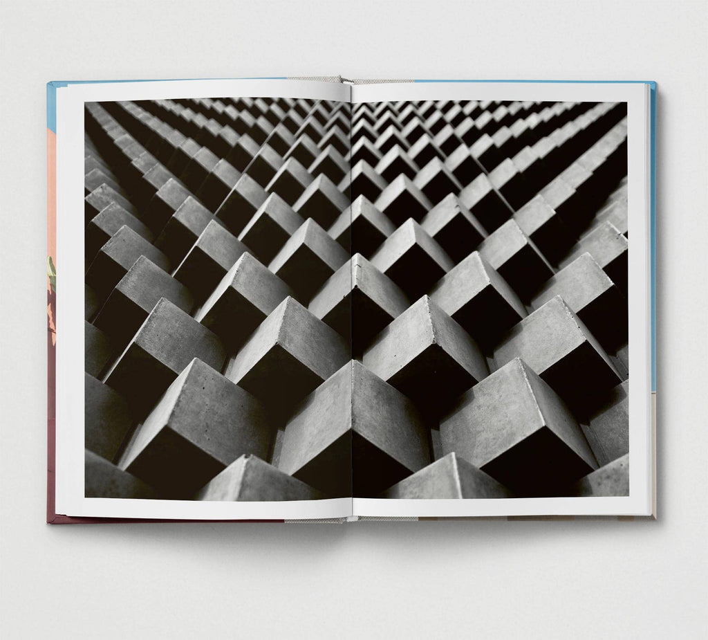 Open book showing a black and white geometric pattern
