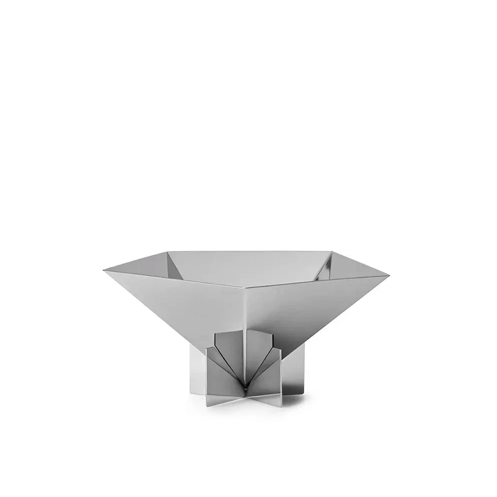 Modern silver bowl with geometric design on a white background