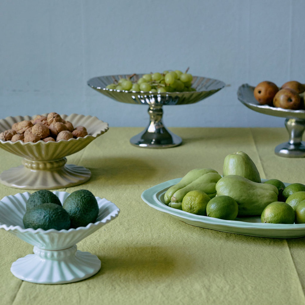 Mint green platter on white background