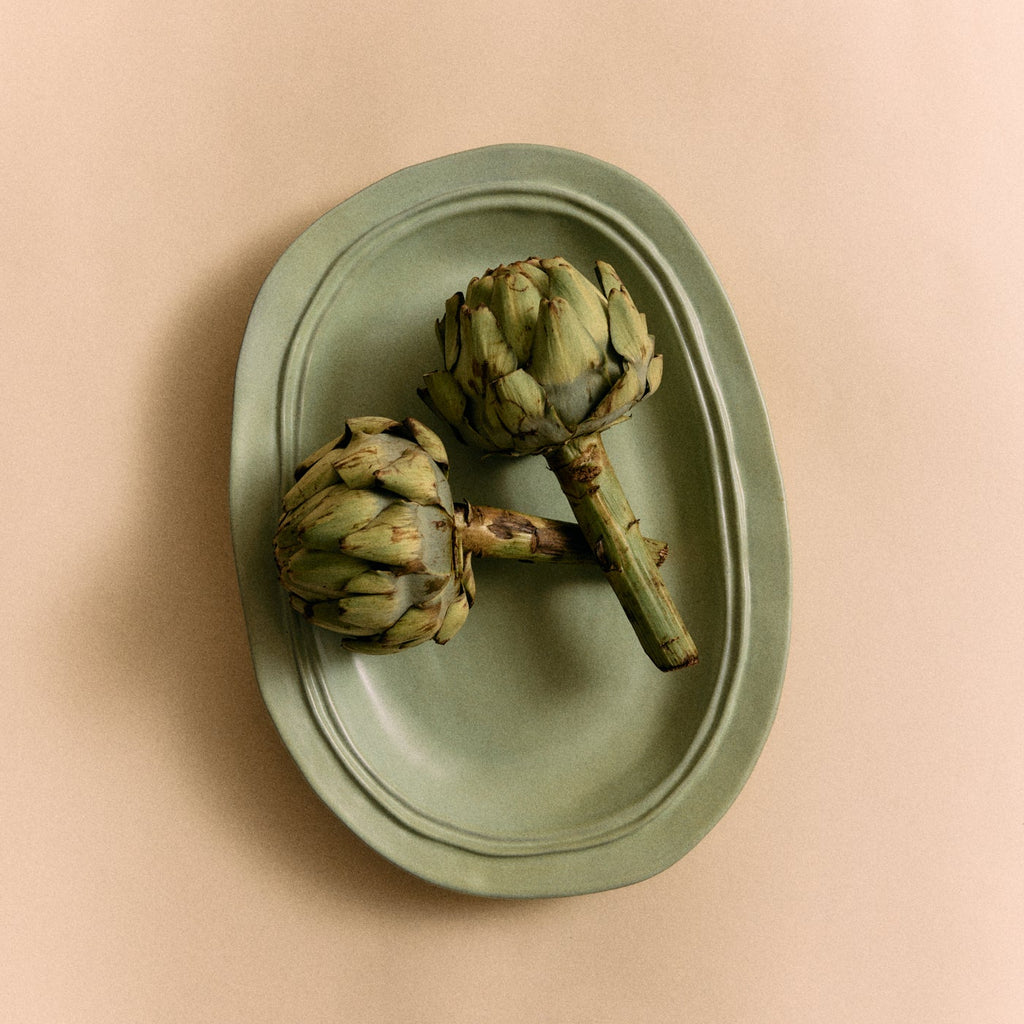Mint green platter on white background