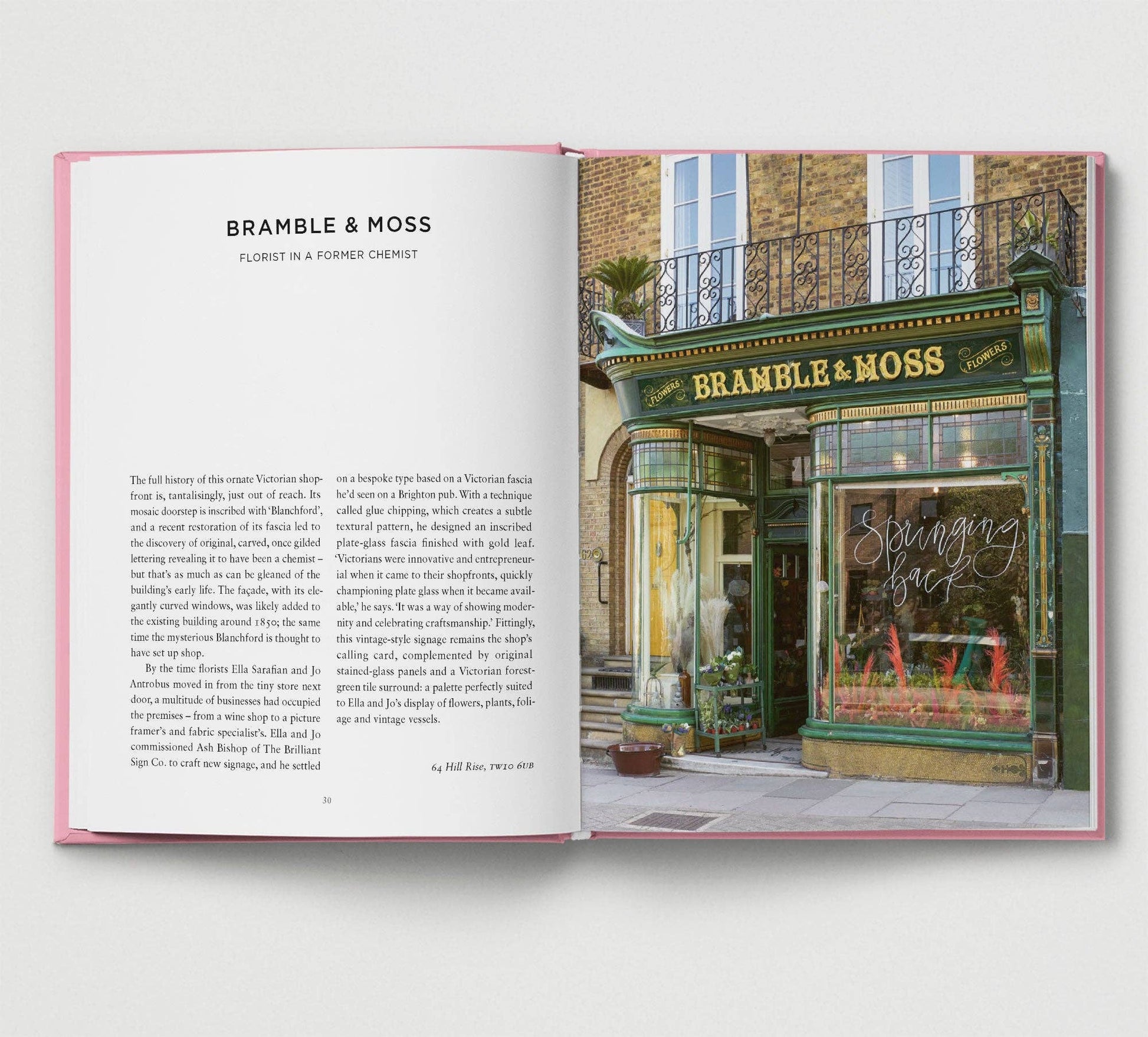 Open book showing a page with text and an image of a store front labeled 'Bramble & Moss'.