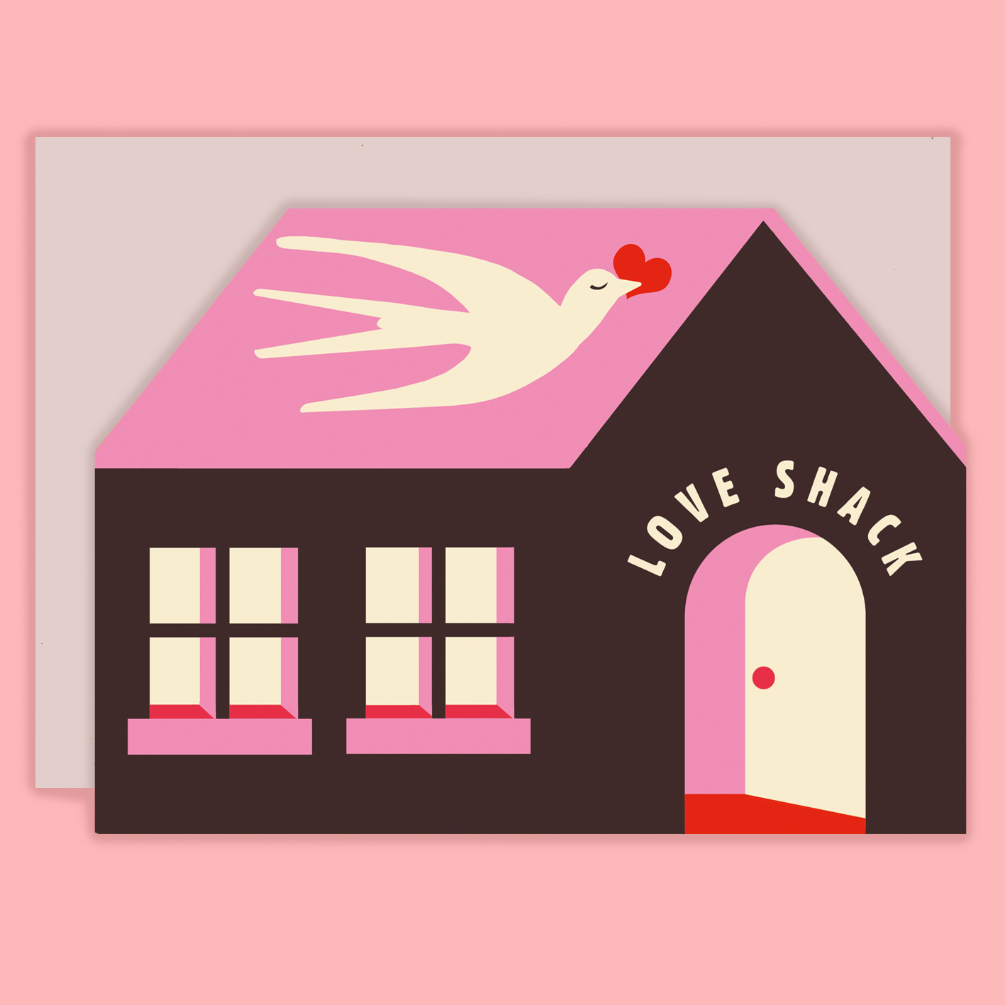 Cut out of a brown and pink house with the words "love shack" above the door