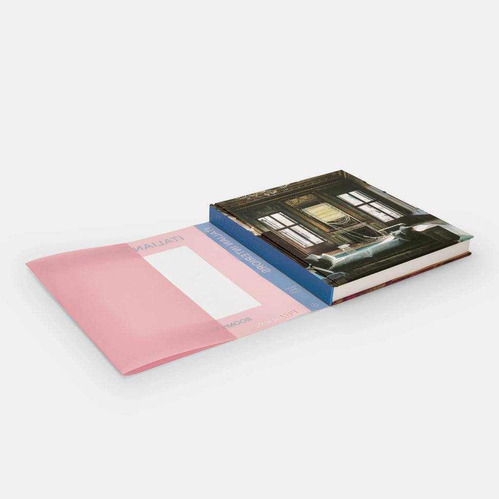 Open book with a pink cover and a black and white interior on a white background