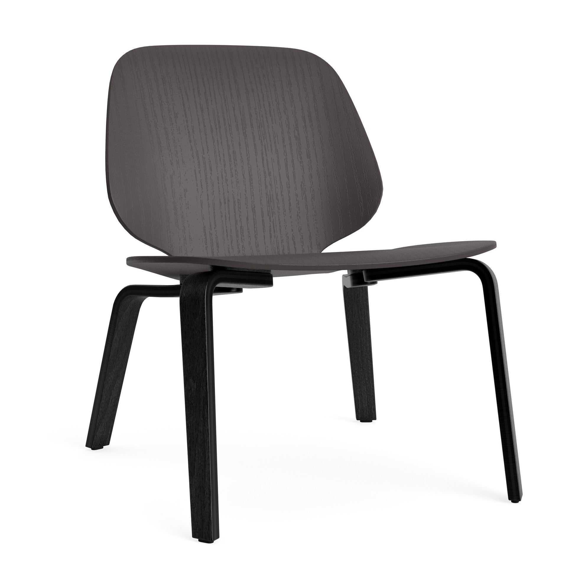 Modern lounge chair with a black oak frame on a white background