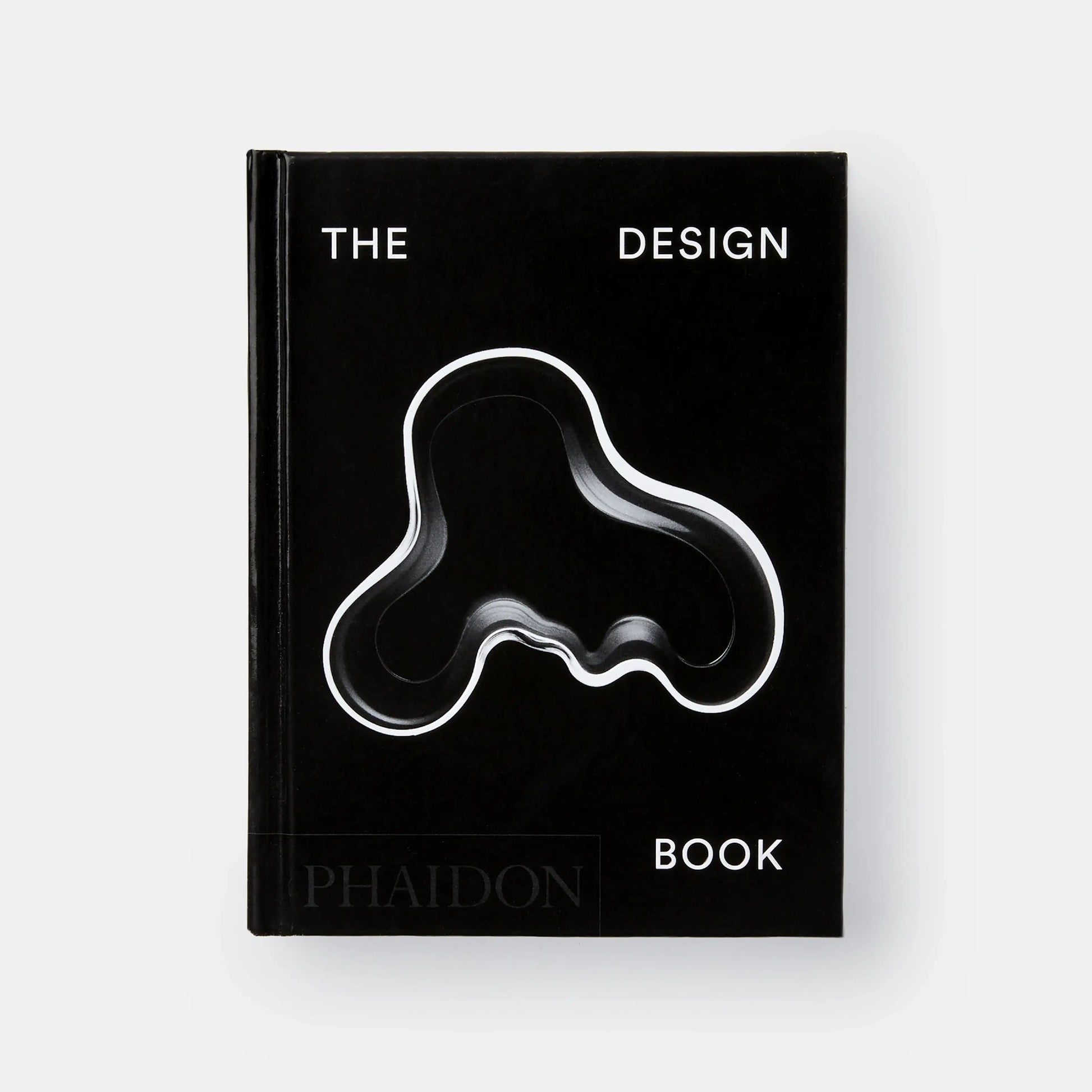 Book titled 'The Design Book' by Phaidon on a white background