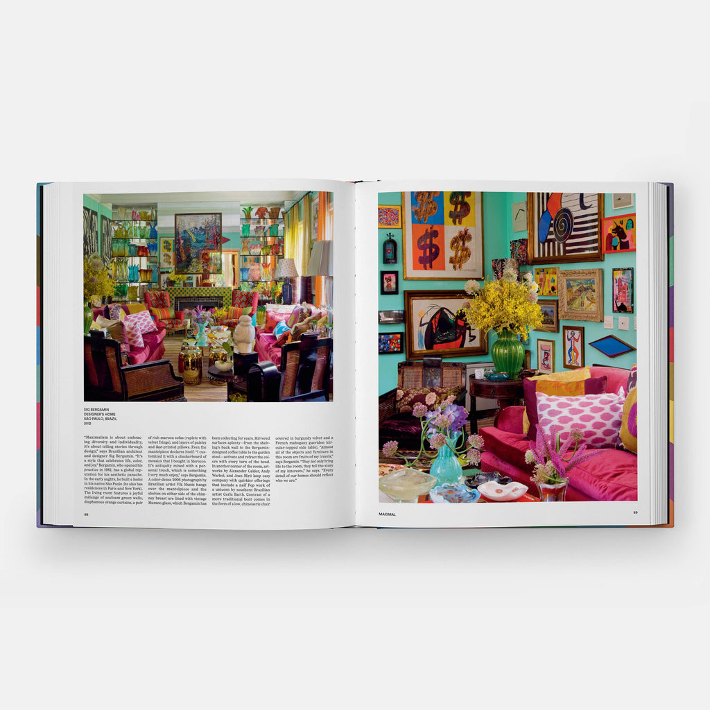 Open book showing a colorful interior design scene with furniture and decor.