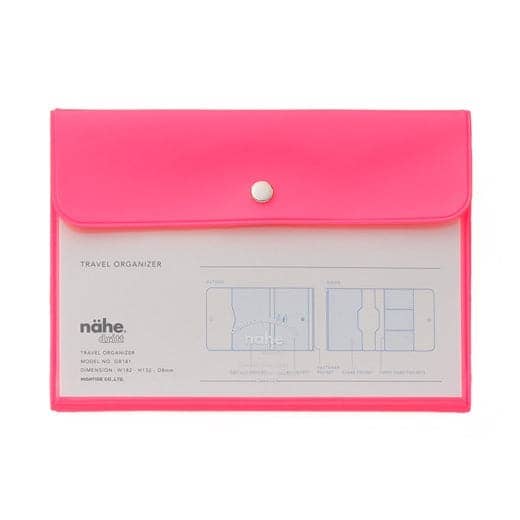 Pink travel organizer with a label on a white background