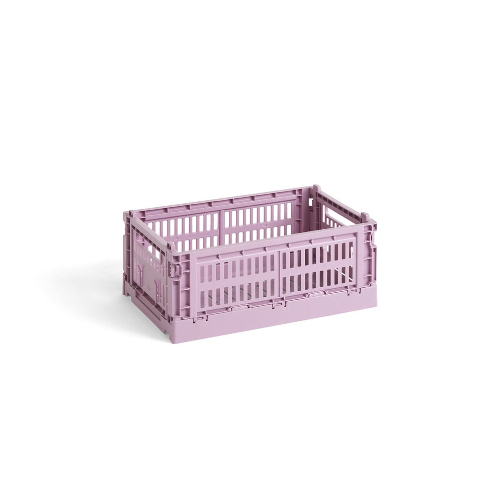 Pink storage crate on a white background