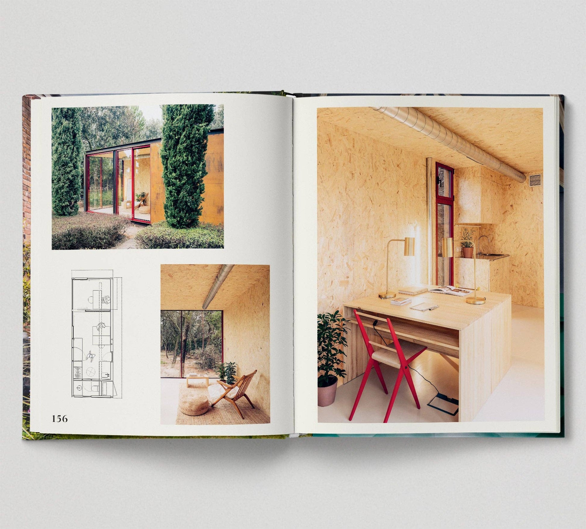 Open book showing interior design images of a modern home.