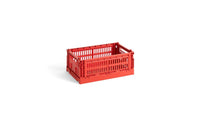 Red plastic crate on a white background