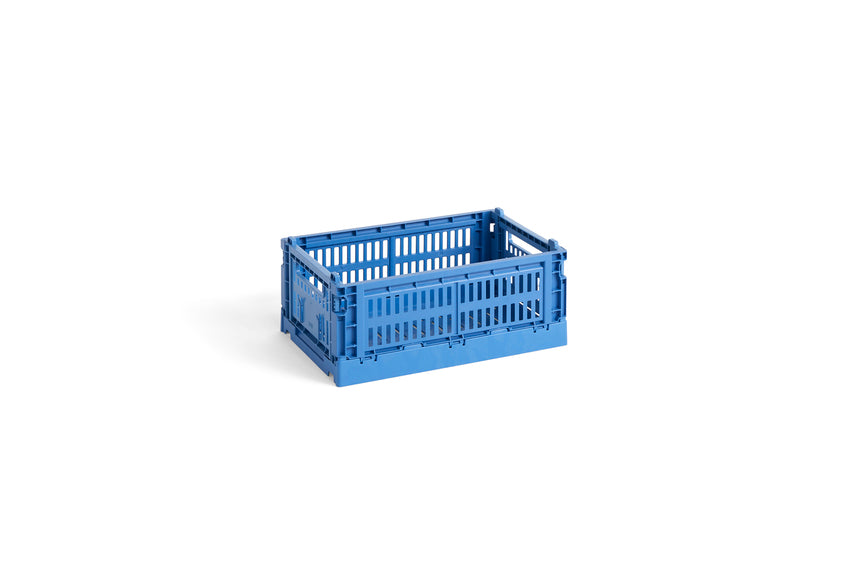 Blue plastic crate on a white background