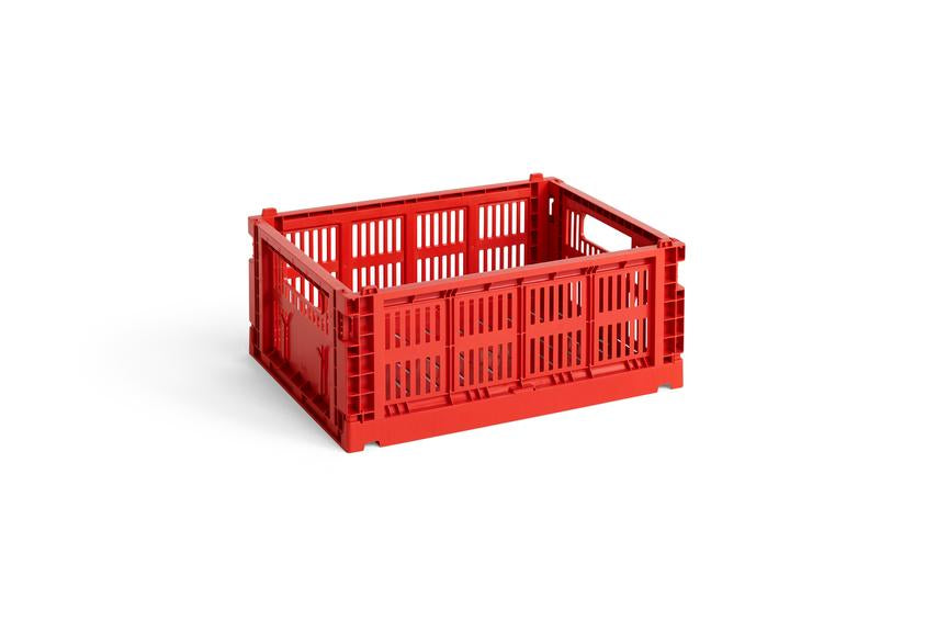 Red plastic crate on a white background