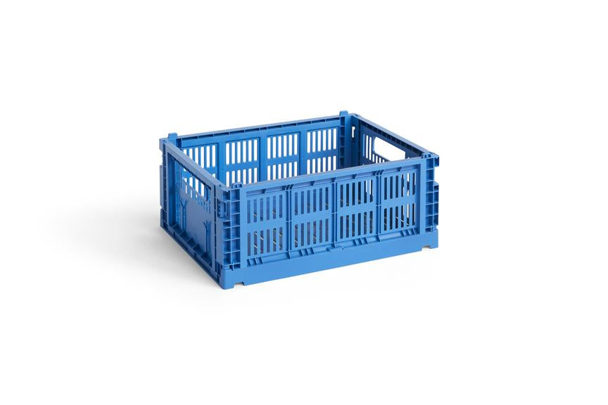 Blue plastic crate on a white background