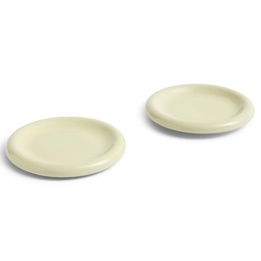 Two pistachio coloured BARRO plates on a white background