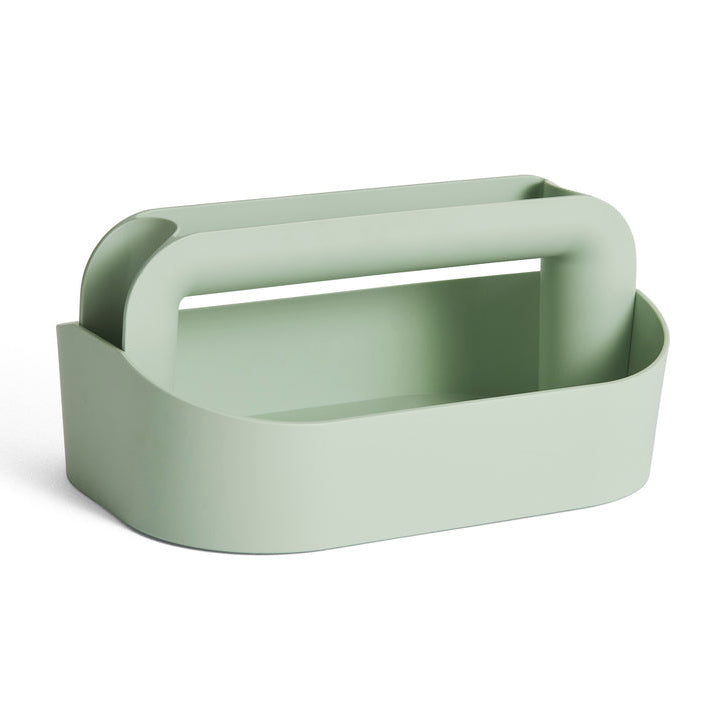 Mint coloured toolbox on white background