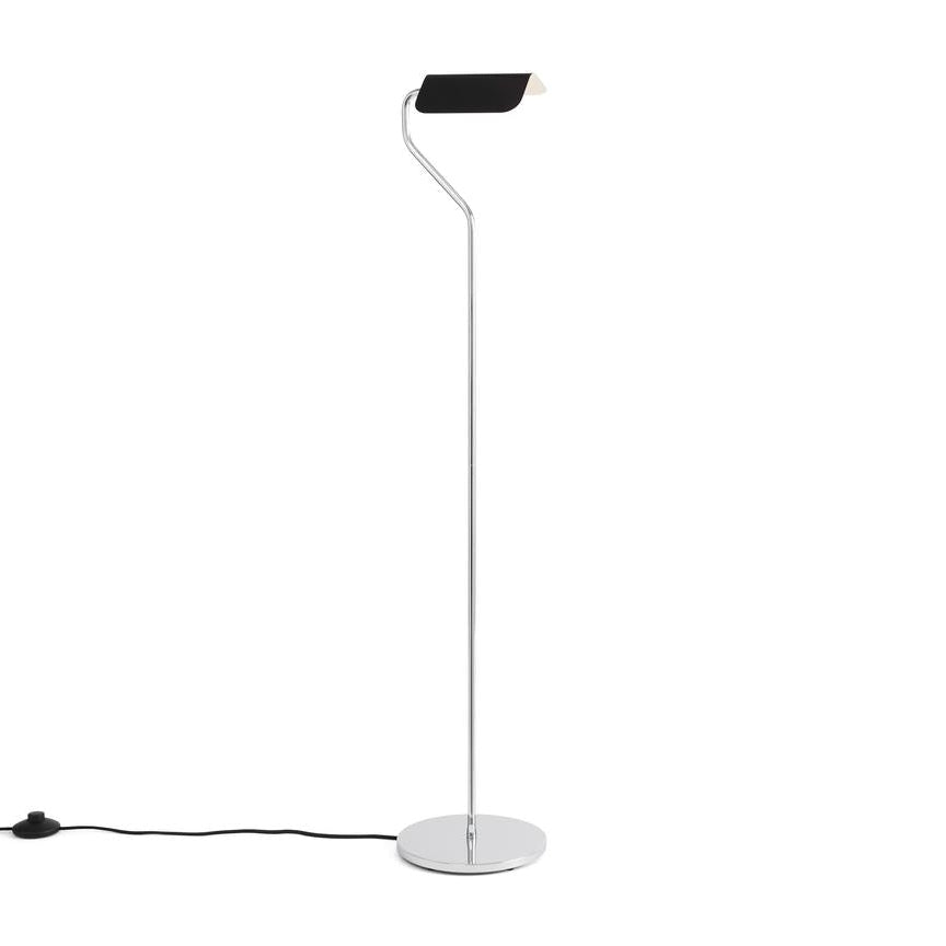 Modern floor lamp with a black shade on a white background
