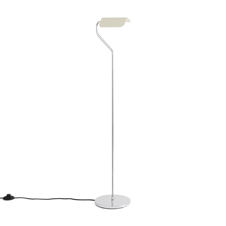 Modern floor lamp with a white shade on a white background