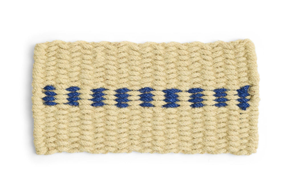 Beige woven door mat with blue stitching on a white background
