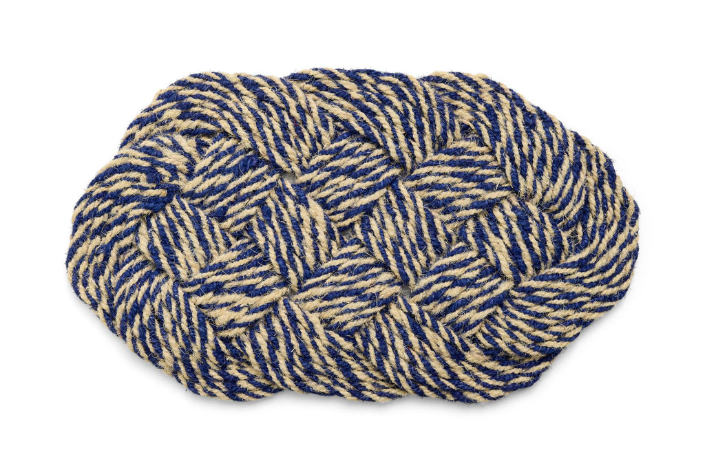 Woven mat with blue and beige pattern on a white background