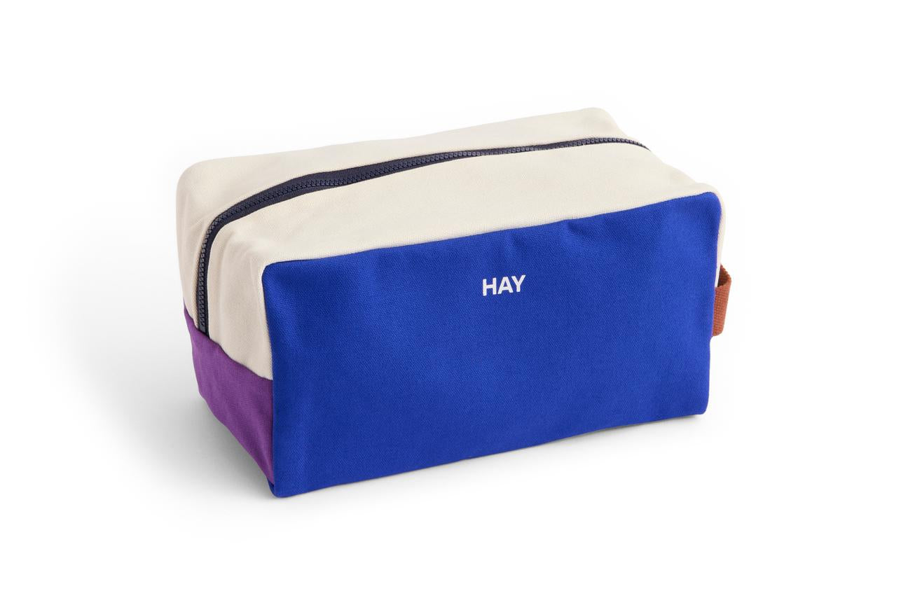 Multicolored pouch with 'HAY' branding on a white background