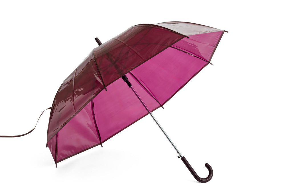 Pink and maroon umbrella on a white background