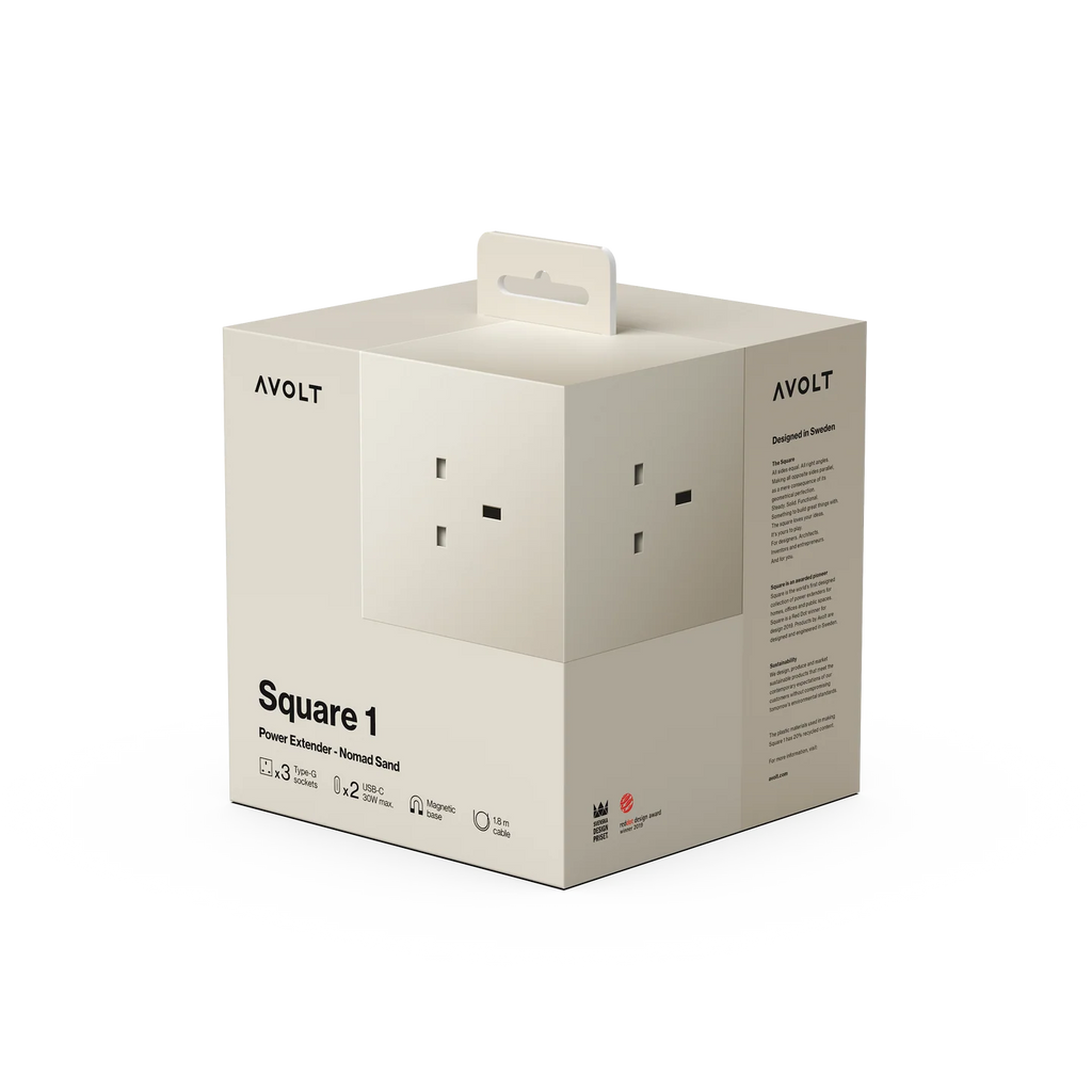 AVOLT Square 1 power cord adapter retail box, featuring a minimalist beige design with a printed illustration of the UK three-pin plug on the front and side panels.