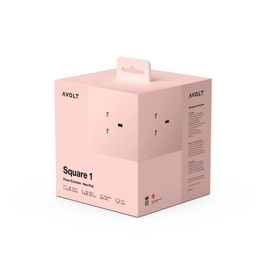 A light pink AVOLT Square 1 power extender box with a built-in handle, shown on a clean white background.