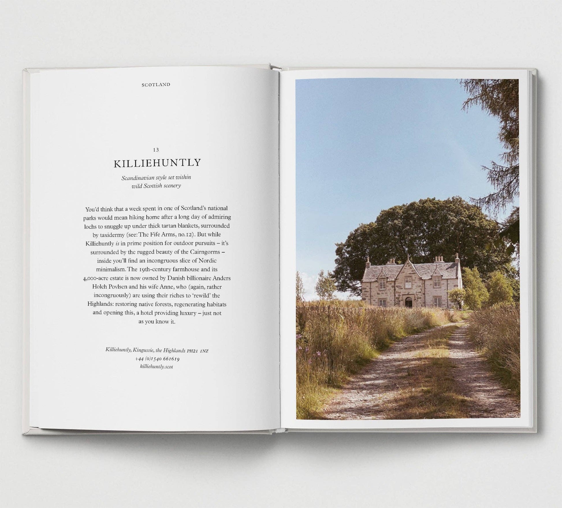 Open book with text on the left and a scenic photograph of a house on the right.
