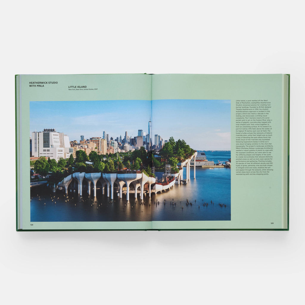 Open book showing a cityscape with a waterfront and skyline.