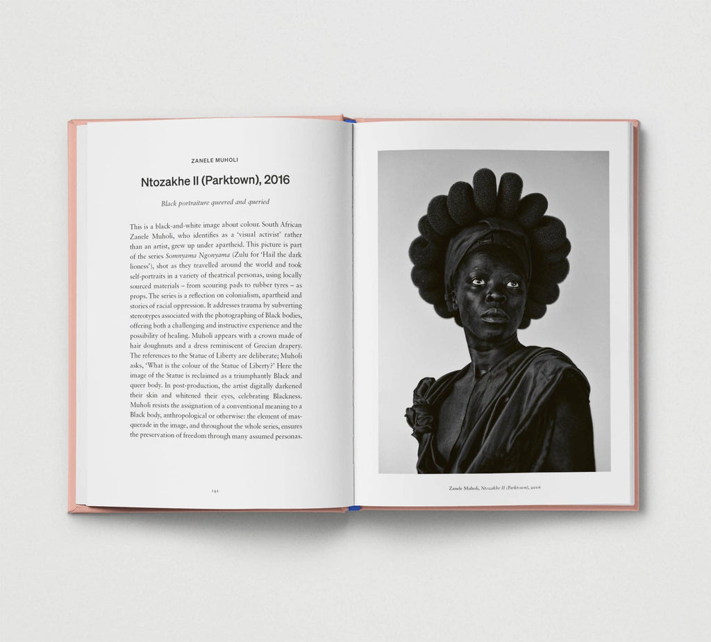 Open book showing a black and white portrait with text on a light gray background