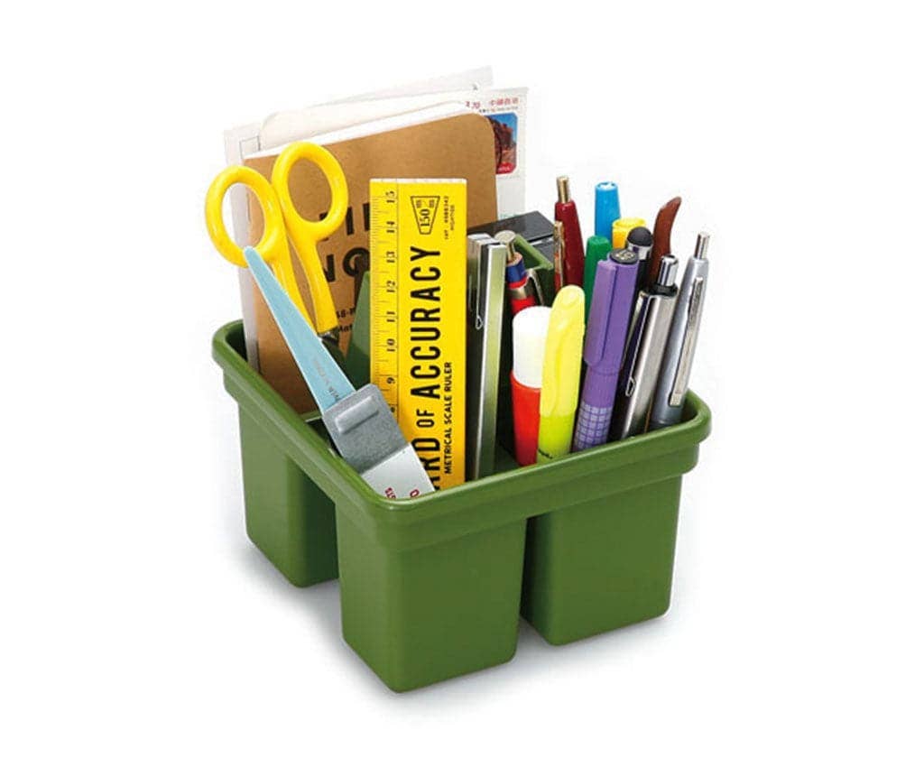 Green container holding various school supplies on a white background