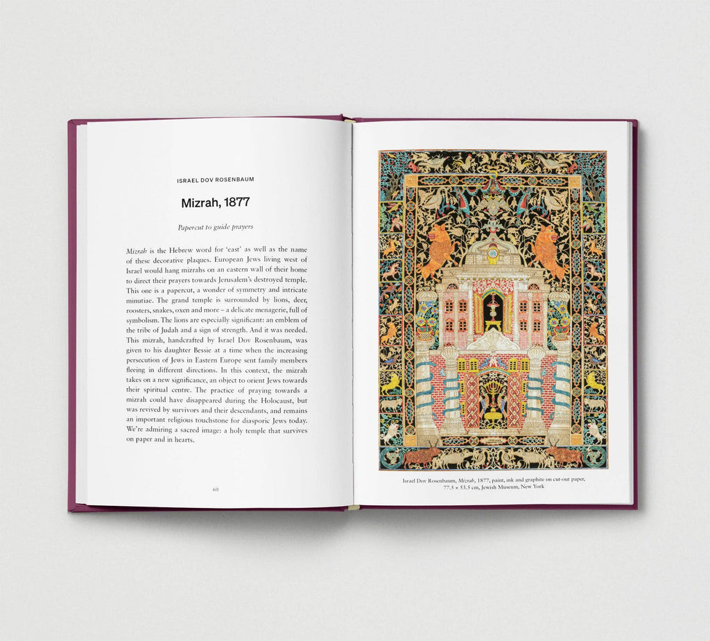 Open book with text and an illustration of a building on a white background