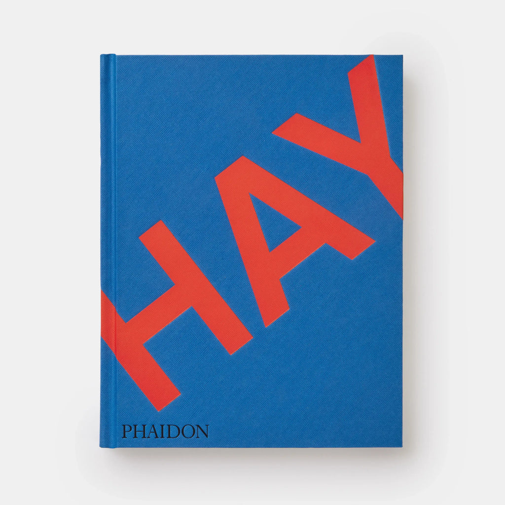 Book with 'HAY' and 'PHAIDON' on a blue cover against a white background