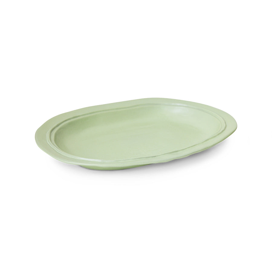 Mint green platter on white background