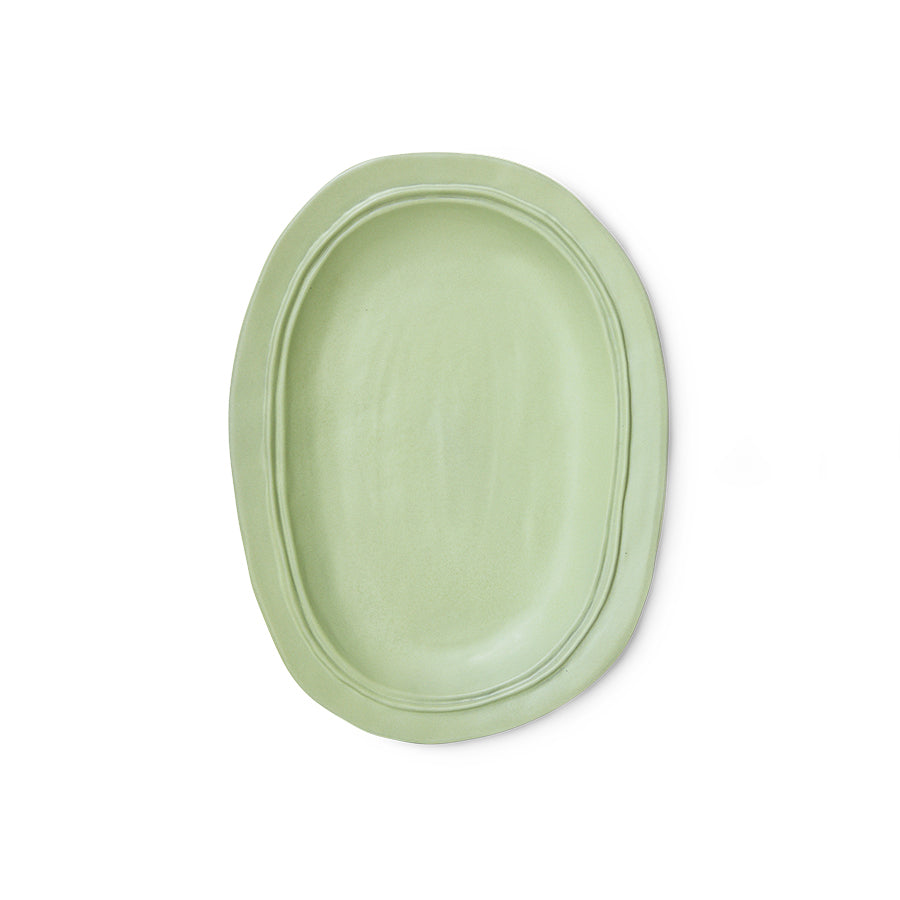 Mint green platter on white background