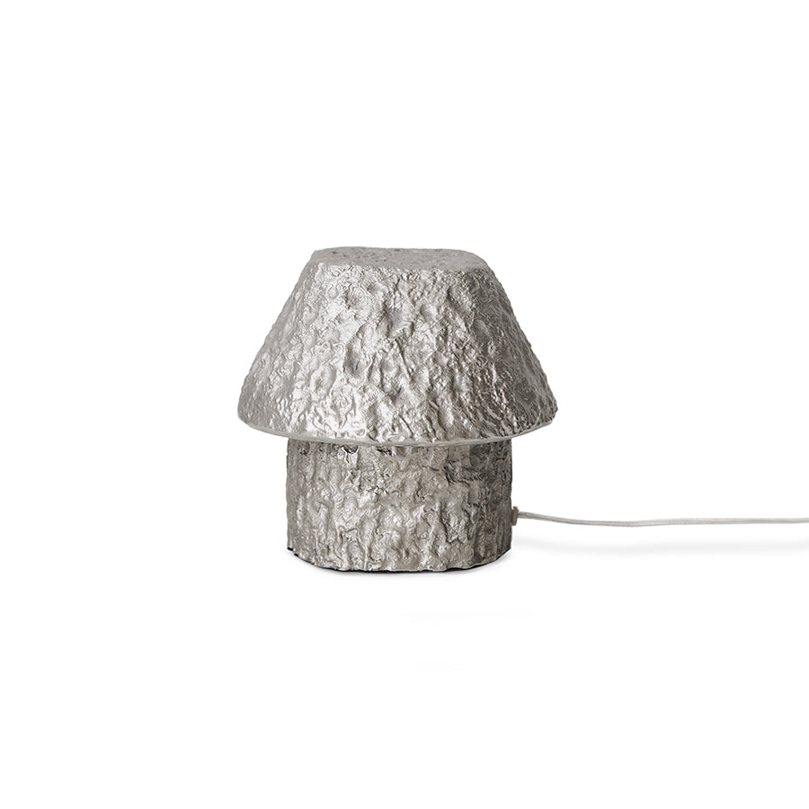 Textured table lamp on a white background